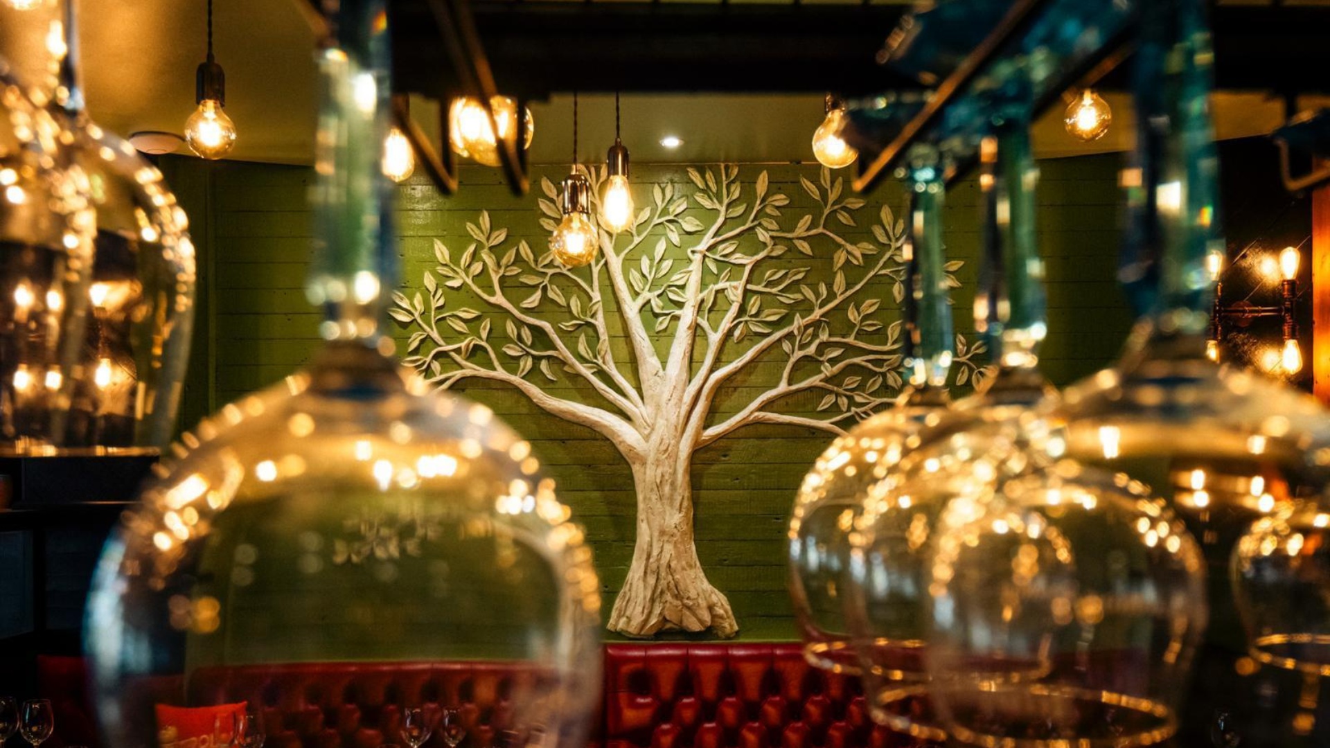 Olive tree art with wine glasses